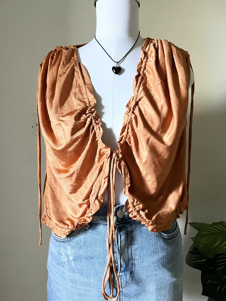 Orange Shrug style top 