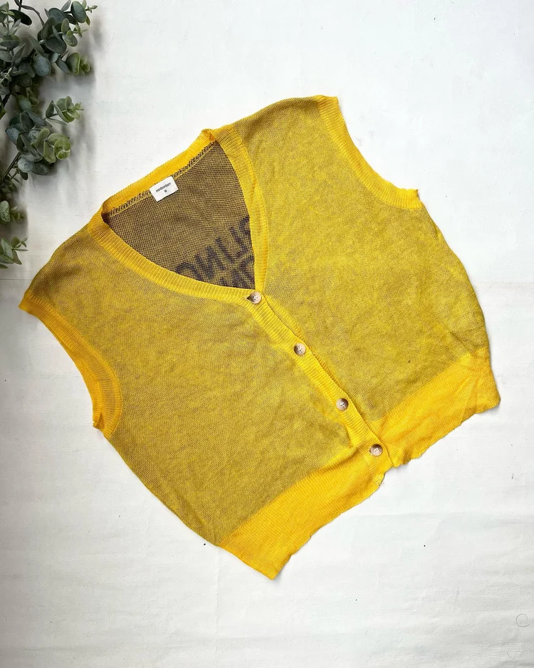 Yellow sweater vest 