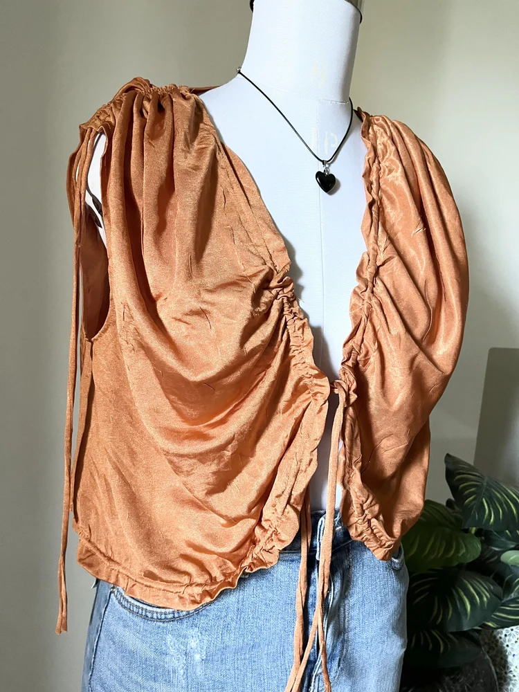 Orange Shrug style top 