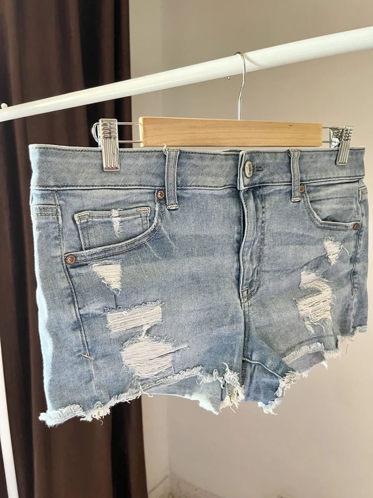 Ripped blue shorts