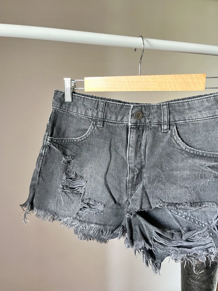 Black ripped shorts