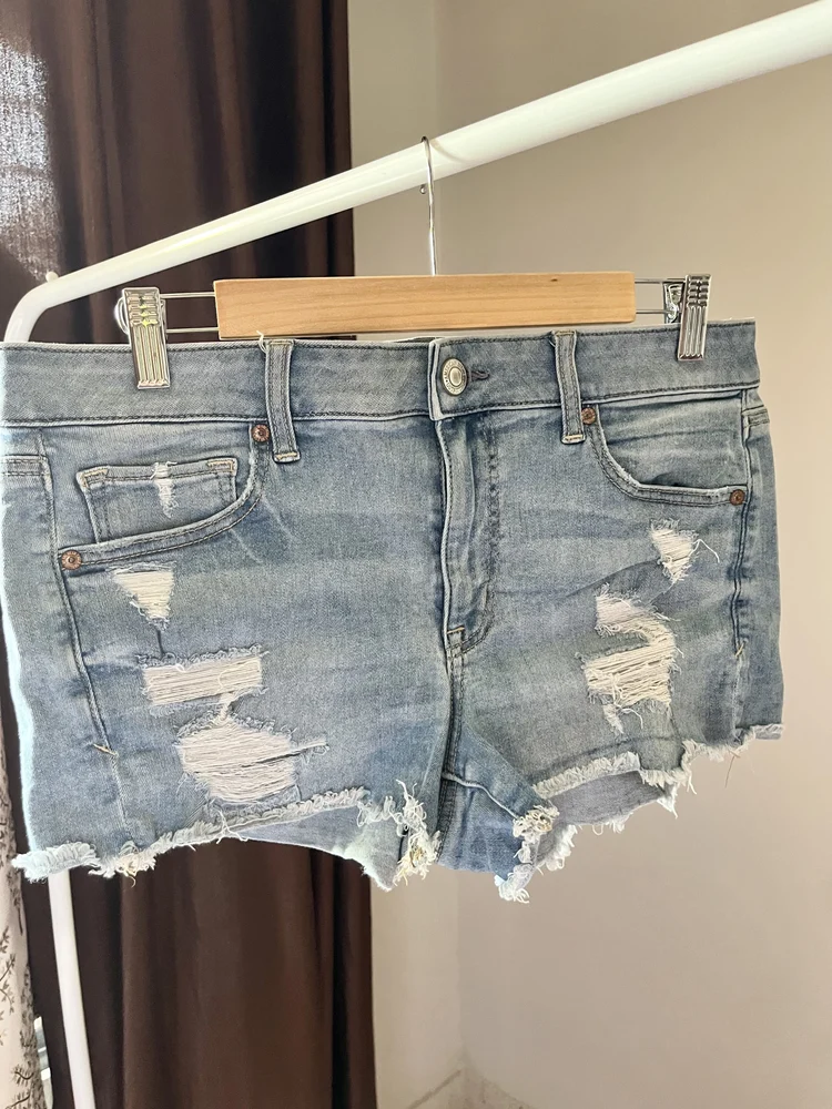 Ripped blue shorts