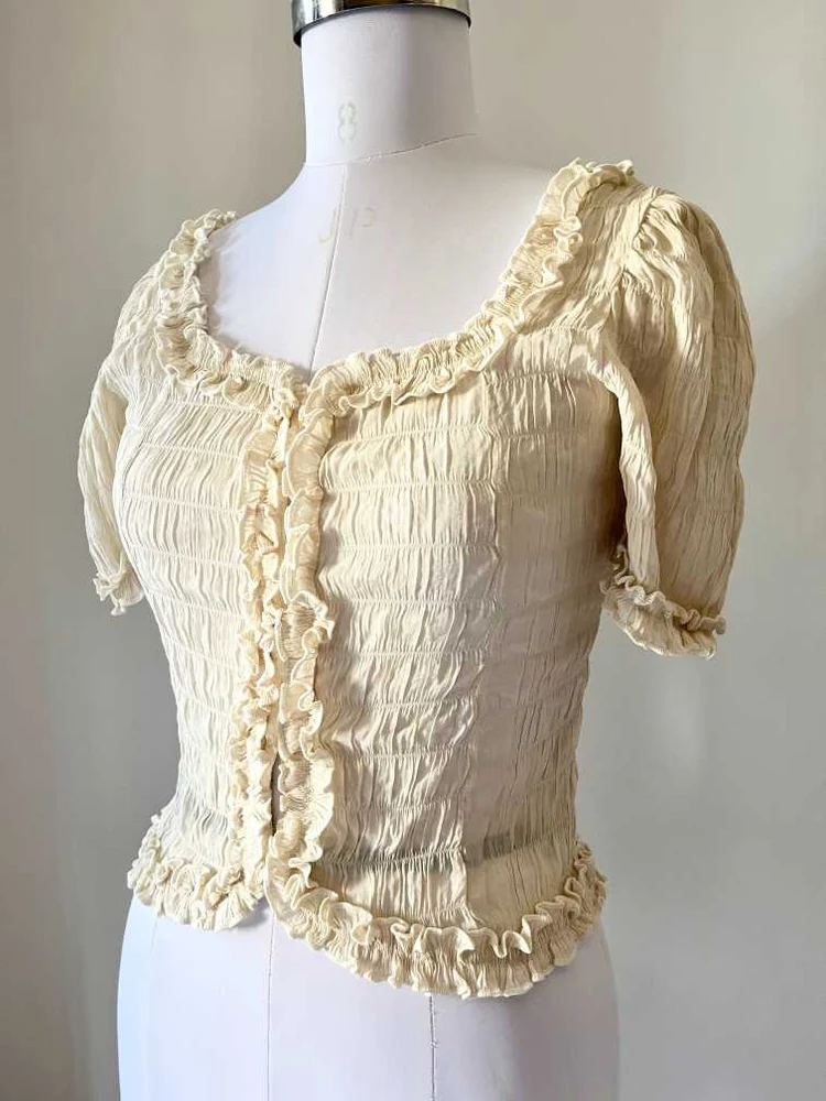 Beige frill top 