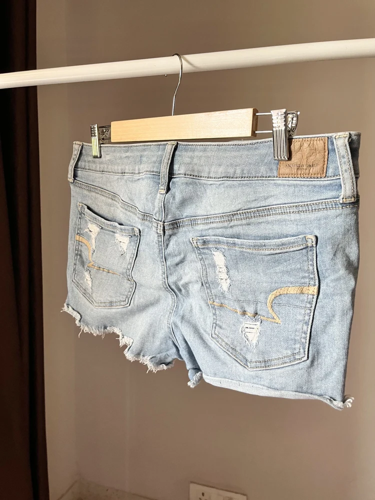 Ripped blue shorts