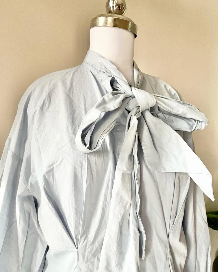 Pastel blue tie-up neck shirt 