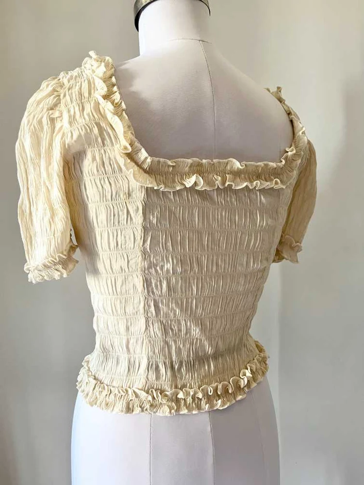 Beige frill top 