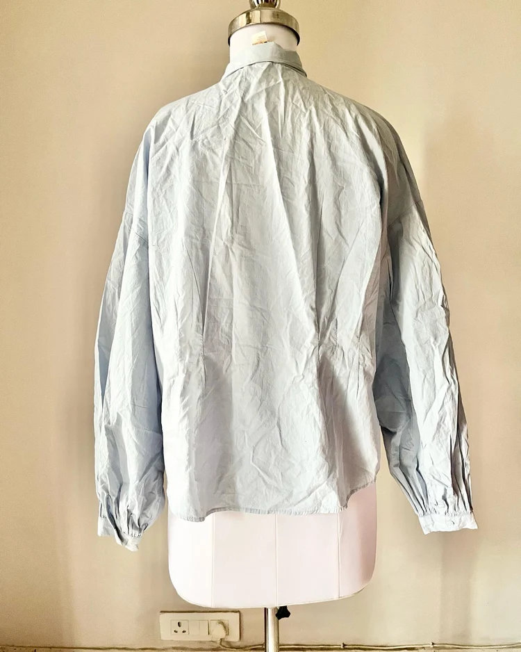 Pastel blue tie-up neck shirt 